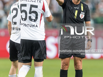 Jurgen Celhaka, Artur Jedrzejczyk, Referee Jaroslaw Przybyl during Legia Warsaw vs Rakow Czestochowa - PKO  Ekstraklasa match in Warsaw, Pol...