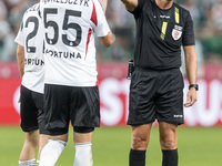 Jurgen Celhaka, Artur Jedrzejczyk, Referee Jaroslaw Przybyl during Legia Warsaw vs Rakow Czestochowa - PKO  Ekstraklasa match in Warsaw, Pol...