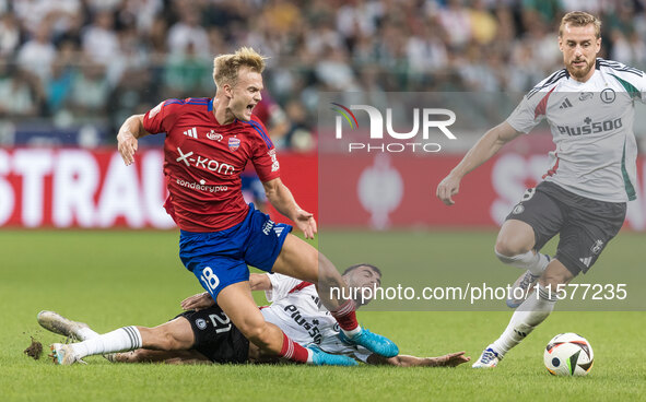 Jurgen Celhaka, Jonatan Braut Brunes, Rafal Augustyniak during Legia Warsaw vs Rakow Czestochowa - PKO  Ekstraklasa match in Warsaw, Poland...