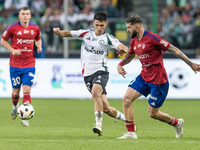 Bartosz Kapustka, Jean Carlos Silva during Legia Warsaw vs Rakow Czestochowa - PKO  Ekstraklasa match in Warsaw, Poland on September 15, 202...