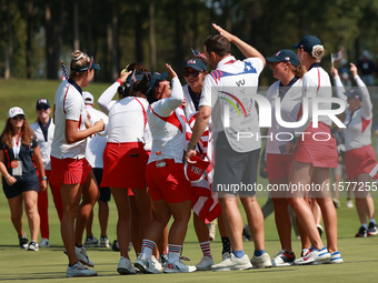 GAINESVILLE, VIRGINIA - SEPTEMBER 15: Team USA players celebrates after winning the Solheim Cup at Robert Trent Jones Golf Club on Sunday, S...