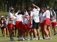 GAINESVILLE, VIRGINIA - SEPTEMBER 15: Team USA players celebrates after winning the Solheim Cup at Robert Trent Jones Golf Club on Sunday, S...