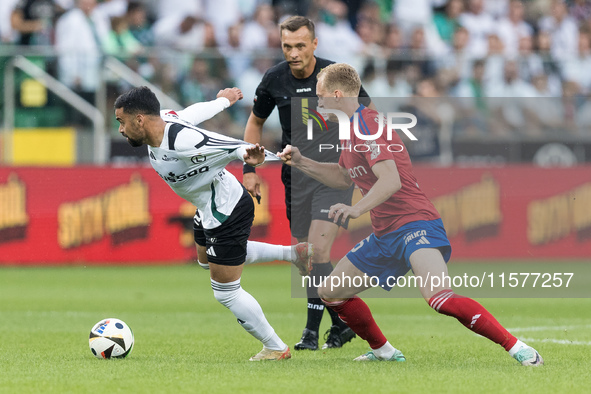 Luquinhas, Referee Jaroslaw Przybyl, Gustav Berggren during Legia Warsaw vs Rakow Czestochowa - PKO  Ekstraklasa match in Warsaw, Poland on...