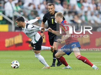 Luquinhas, Referee Jaroslaw Przybyl, Gustav Berggren during Legia Warsaw vs Rakow Czestochowa - PKO  Ekstraklasa match in Warsaw, Poland on...