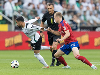 Luquinhas, Referee Jaroslaw Przybyl, Gustav Berggren during Legia Warsaw vs Rakow Czestochowa - PKO  Ekstraklasa match in Warsaw, Poland on...