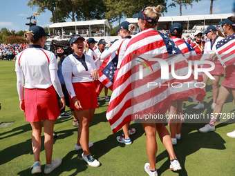 GAINESVILLE, VIRGINIA - SEPTEMBER 15: Team USA celebrate after winning during the Solheim Cup at Robert Trent Jones Golf Club on Sunday, Sep...