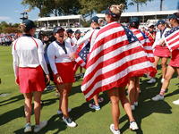 GAINESVILLE, VIRGINIA - SEPTEMBER 15: Team USA celebrate after winning during the Solheim Cup at Robert Trent Jones Golf Club on Sunday, Sep...