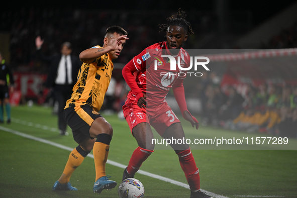 Lautaro Martinez of FC Inter and Bondo Warren of AC Monza during the Italian Serie A football match between AC Monza and Inter FC Internazio...