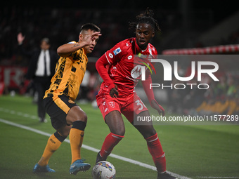 Lautaro Martinez of FC Inter and Bondo Warren of AC Monza during the Italian Serie A football match between AC Monza and Inter FC Internazio...