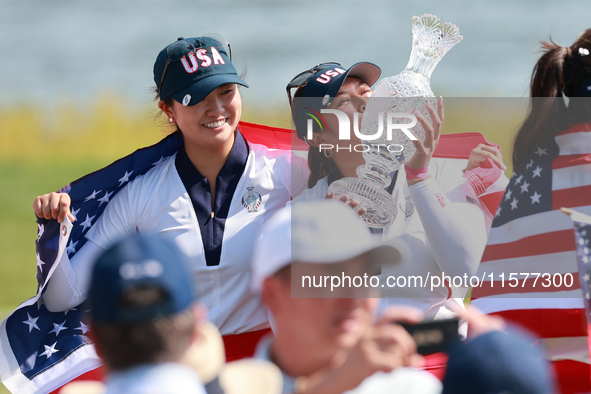 GAINESVILLE, VIRGINIA - SEPTEMBER 15: Lilia Vu of Team USA kisses the trophy after winning the Solheim Cup at Robert Trent Jones Golf Club o...