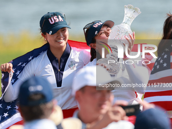 GAINESVILLE, VIRGINIA - SEPTEMBER 15: Lilia Vu of Team USA kisses the trophy after winning the Solheim Cup at Robert Trent Jones Golf Club o...