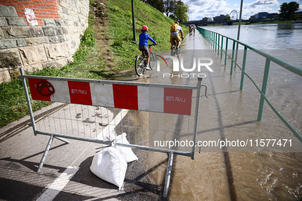 After heavy rainfall the level of the Vistula River has rised flooding a part of the boulvards in Krakow, Poland on September 15th, 2024. St...