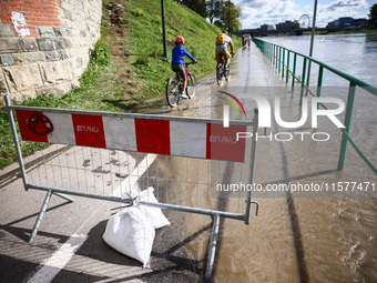 After heavy rainfall the level of the Vistula River has rised flooding a part of the boulvards in Krakow, Poland on September 15th, 2024. St...