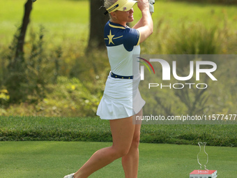 GAINESVILLE, VIRGINIA - SEPTEMBER 15: Charley Hull of Team Europe plays her tee shot on the 10th hole during single matches on Day Three of...