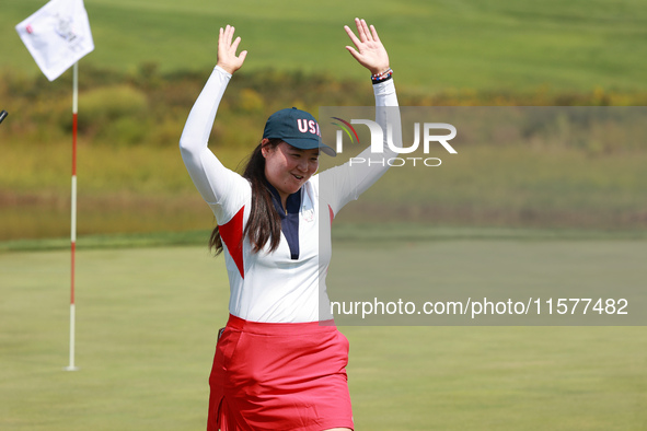 GAINESVILLE, VIRGINIA - SEPTEMBER 15: Allisen Corpuz of the United States celebrates her putt on the 15th green during single matches on Day...