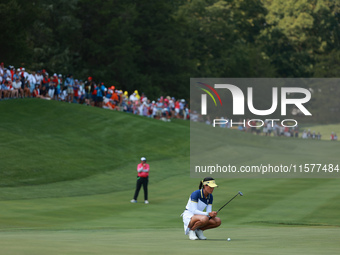 GAINESVILLE, VIRGINIA - SEPTEMBER 15: Celine Boutier of Team Europe lines up her putt on the 15th green during single matches on Day Three o...