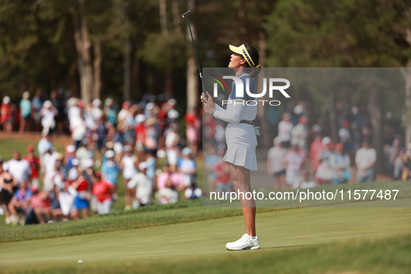 GAINESVILLE, VIRGINIA - SEPTEMBER 15: Celine Boutier of Team Europe reacts to her putt on the 16th green during single matches on Day Three...