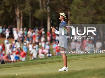 GAINESVILLE, VIRGINIA - SEPTEMBER 15: Celine Boutier of Team Europe reacts to her putt on the 16th green during single matches on Day Three...