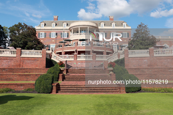 GAINESVILLE, VIRGINIA - SEPTEMBER 15: The clubhouse faces the afternoon sun at the conclusion of the final round of the Solheim Cup at Rober...