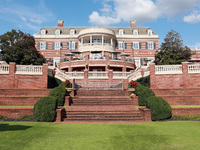 GAINESVILLE, VIRGINIA - SEPTEMBER 15: The clubhouse faces the afternoon sun at the conclusion of the final round of the Solheim Cup at Rober...