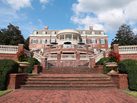 GAINESVILLE, VIRGINIA - SEPTEMBER 15: The clubhouse faces the afternoon sun at the conclusion of the final round of the Solheim Cup at Rober...