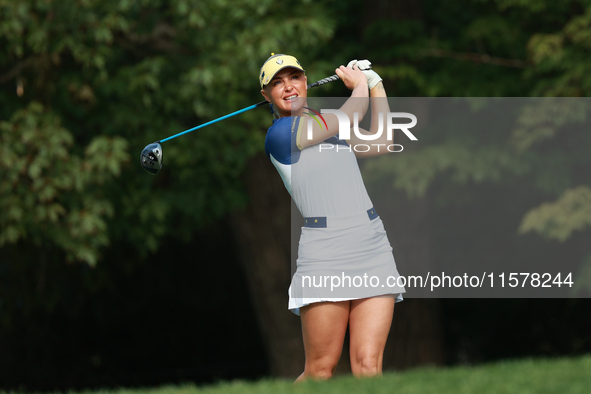 GAINESVILLE, VIRGINIA - SEPTEMBER 15: Charley Hull of Team Europe plays her tee shot on the third hole during single matches on Day Three of...