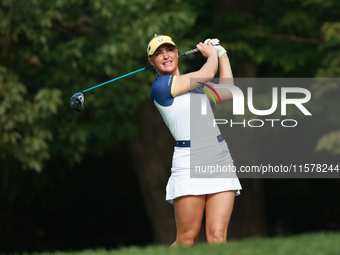 GAINESVILLE, VIRGINIA - SEPTEMBER 15: Charley Hull of Team Europe plays her tee shot on the third hole during single matches on Day Three of...