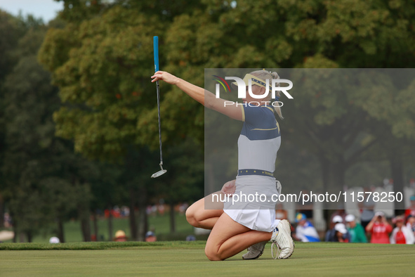 GAINESVILLE, VIRGINIA - SEPTEMBER 15: Charley Hull of Team Europe lines up her putt on the third green during single matches on Day Three of...