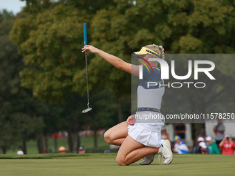 GAINESVILLE, VIRGINIA - SEPTEMBER 15: Charley Hull of Team Europe lines up her putt on the third green during single matches on Day Three of...