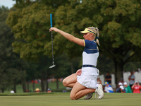 GAINESVILLE, VIRGINIA - SEPTEMBER 15: Charley Hull of Team Europe lines up her putt on the third green during single matches on Day Three of...