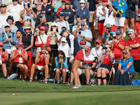 GAINESVILLE, VIRGINIA - SEPTEMBER 15: Nelly Korda of the United States follows her putt on the fourth green during single matches on Day Thr...