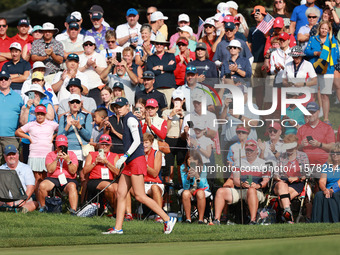 GAINESVILLE, VIRGINIA - SEPTEMBER 15: Nelly Korda of the United States follows her putt on the fourth green during single matches on Day Thr...