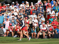 GAINESVILLE, VIRGINIA - SEPTEMBER 15: Nelly Korda of the United States follows her putt on the fourth green during single matches on Day Thr...