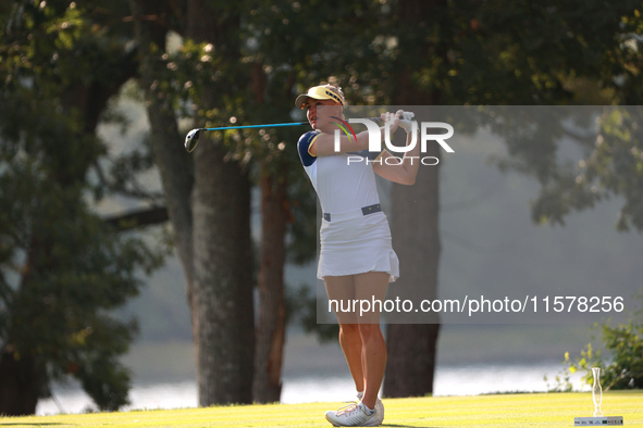 GAINESVILLE, VIRGINIA - SEPTEMBER 15: Charley Hull of Team Europe plays her tee shot on the 5th hole during single matches on Day Three of t...