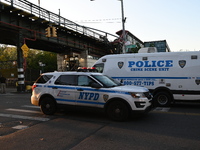 Four people are shot, including two bystanders and an NYPD officer, after two Brooklyn cops open fire on a suspect allegedly armed with a kn...