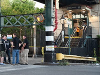 Four people are shot, including two bystanders and an NYPD officer, after two Brooklyn cops open fire on a suspect allegedly armed with a kn...