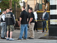 Four people are shot, including two bystanders and an NYPD officer, after two Brooklyn cops open fire on a suspect allegedly armed with a kn...