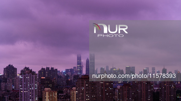 Typhoon Bebinca causes the sky to turn a rare purple in the evening in Shanghai, China, on September 15, 2024. 