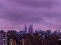 Typhoon Bebinca causes the sky to turn a rare purple in the evening in Shanghai, China, on September 15, 2024. (