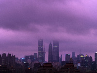 Typhoon Bebinca causes the sky to turn a rare purple in the evening in Shanghai, China, on September 15, 2024. (