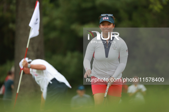 GAINESVILLE, VIRGINIA - SEPTEMBER 15: Megan Khang of the United States acknowledges the crowd after her putt on the 6th green during single...