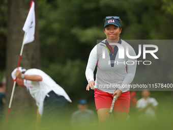 GAINESVILLE, VIRGINIA - SEPTEMBER 15: Megan Khang of the United States acknowledges the crowd after her putt on the 6th green during single...