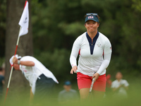 GAINESVILLE, VIRGINIA - SEPTEMBER 15: Megan Khang of the United States acknowledges the crowd after her putt on the 6th green during single...