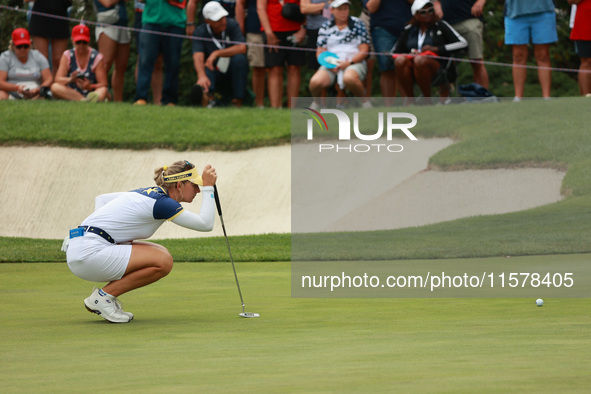 GAINESVILLE, VIRGINIA - SEPTEMBER 15: Emily Kristine Pedersen of Team Europe lines up her putt on the seventh green during single matches on...