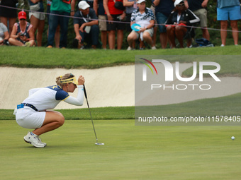 GAINESVILLE, VIRGINIA - SEPTEMBER 15: Emily Kristine Pedersen of Team Europe lines up her putt on the seventh green during single matches on...