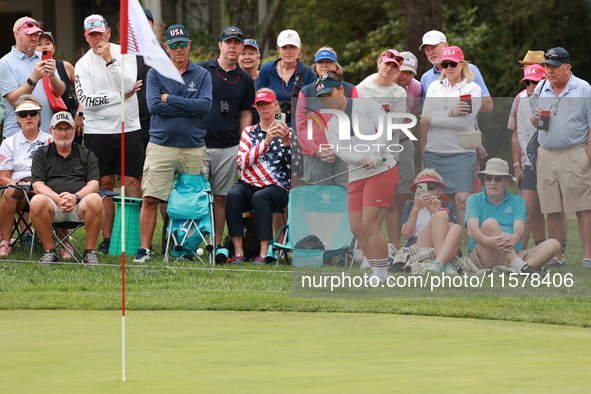 GAINESVILLE, VIRGINIA - SEPTEMBER 15: Megan Khang of the United States chips into the seventh green during single matches on Day Three of th...