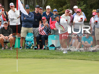 GAINESVILLE, VIRGINIA - SEPTEMBER 15: Megan Khang of the United States chips into the seventh green during single matches on Day Three of th...