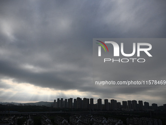 Clouds gather over Nanjing, which is affected by Typhoon Bebika, in Nanjing, Jiangsu province, China, on September 16, 2024. It is reported...