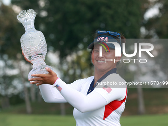 GAINESVILLE, VIRGINIA - SEPTEMBER 15: Megan Khang of the United States poses with the trophy on the 18th green at the conclusion of the Solh...