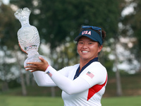 GAINESVILLE, VIRGINIA - SEPTEMBER 15: Megan Khang of the United States poses with the trophy on the 18th green at the conclusion of the Solh...